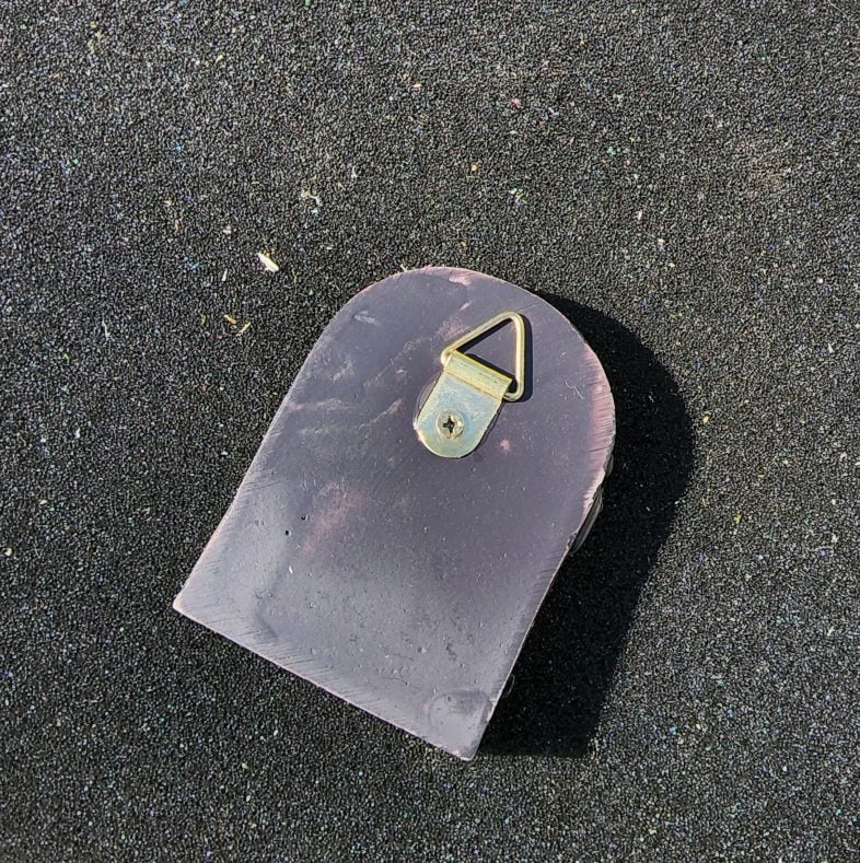 hook on the back of a small fairy garden door