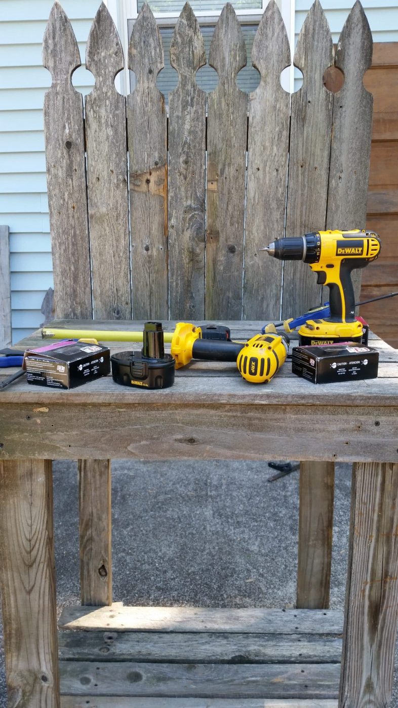 tools resting on a nearly complete potting bench