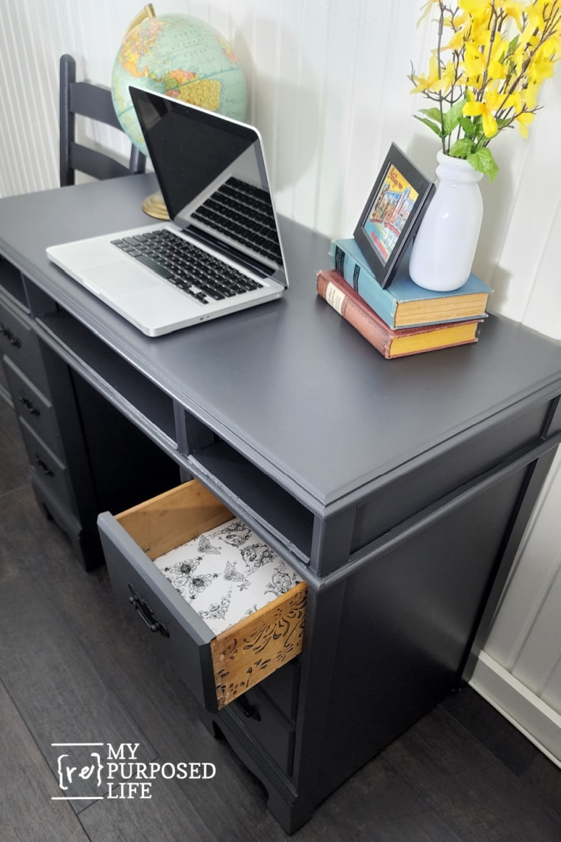dark gray desk makeover with open drawer