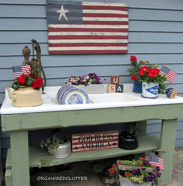red white and blue potting bench decor