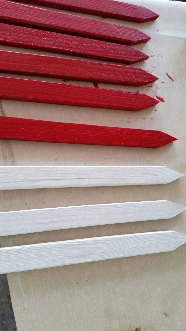 paint three stakes white
