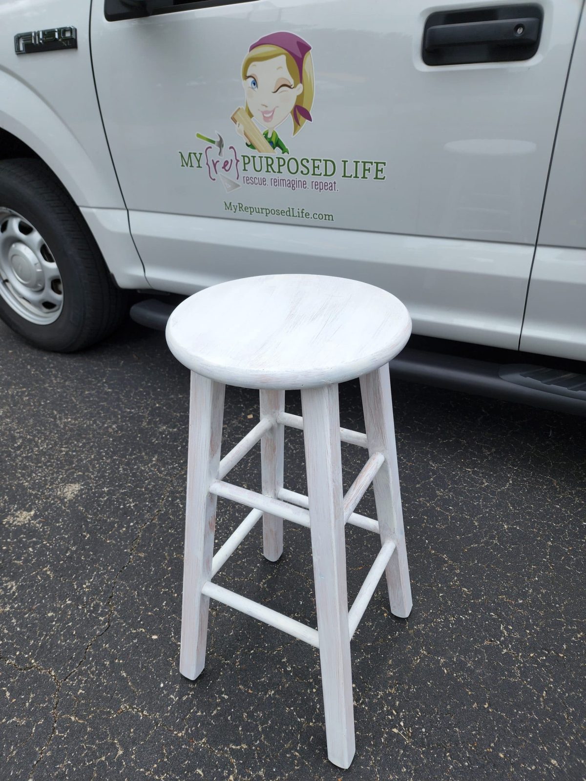 bar stool with first coat of paint