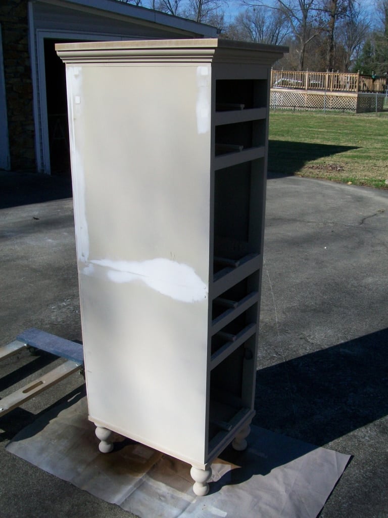 white lingerie chest with patching spackle in the middle where the two sections meet
