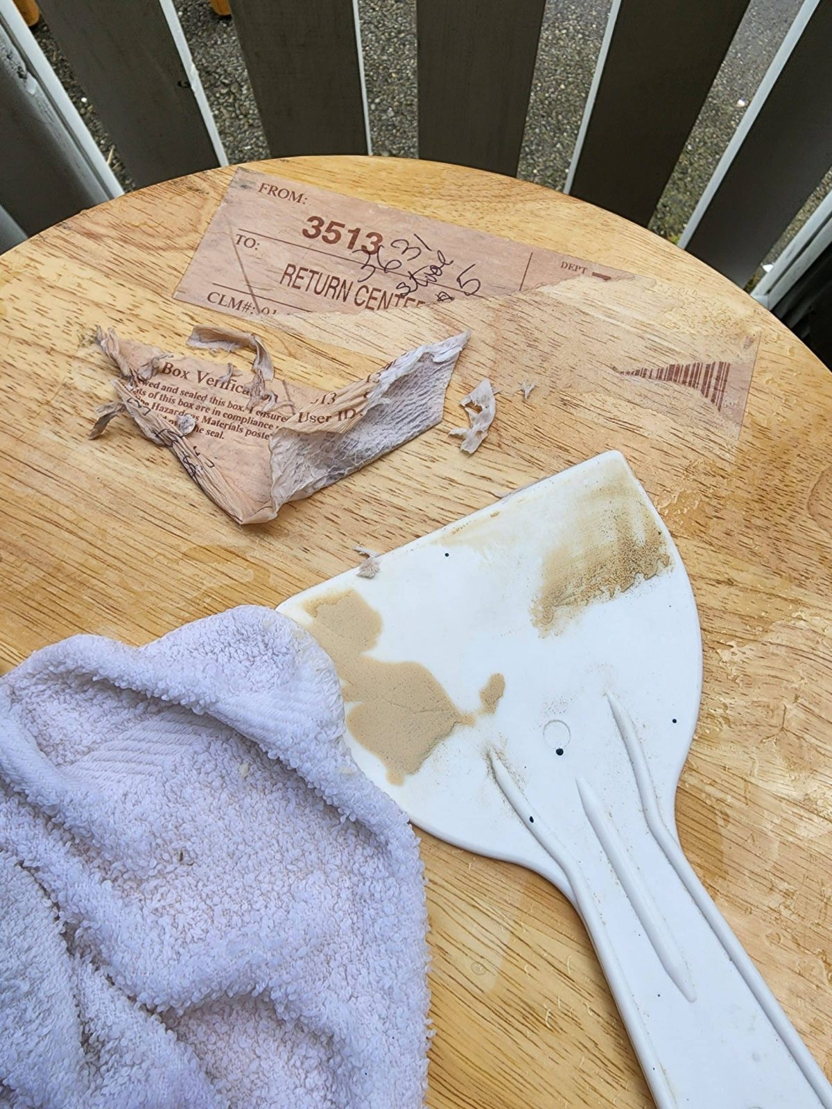use a scraper on wet stickers