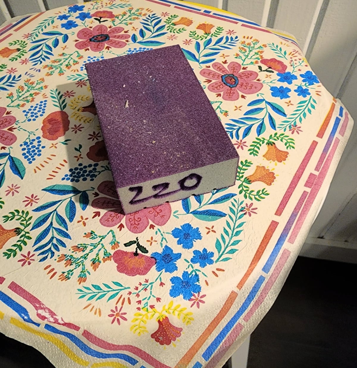 use a sanding sponge to trim napkins at edge
