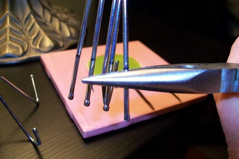 pliers bending curtain hook prong