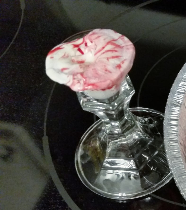 melt a candy on top of the candlestick