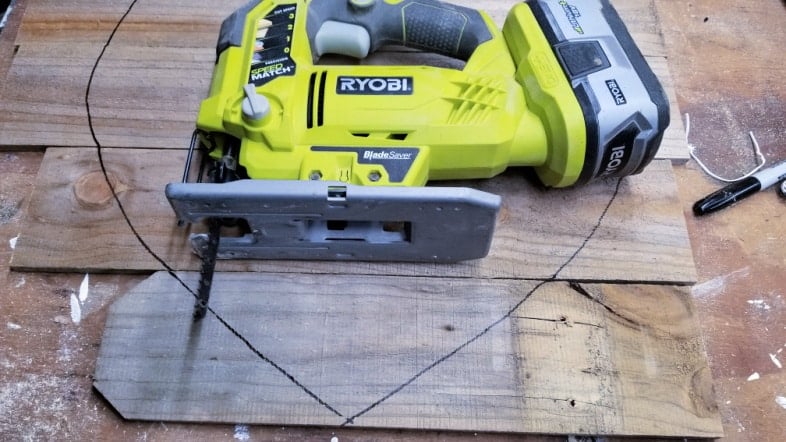 cut reclaimed wooden heart pieces with a jigsaw