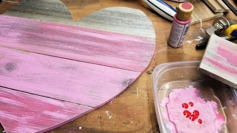 painting a wooden heart