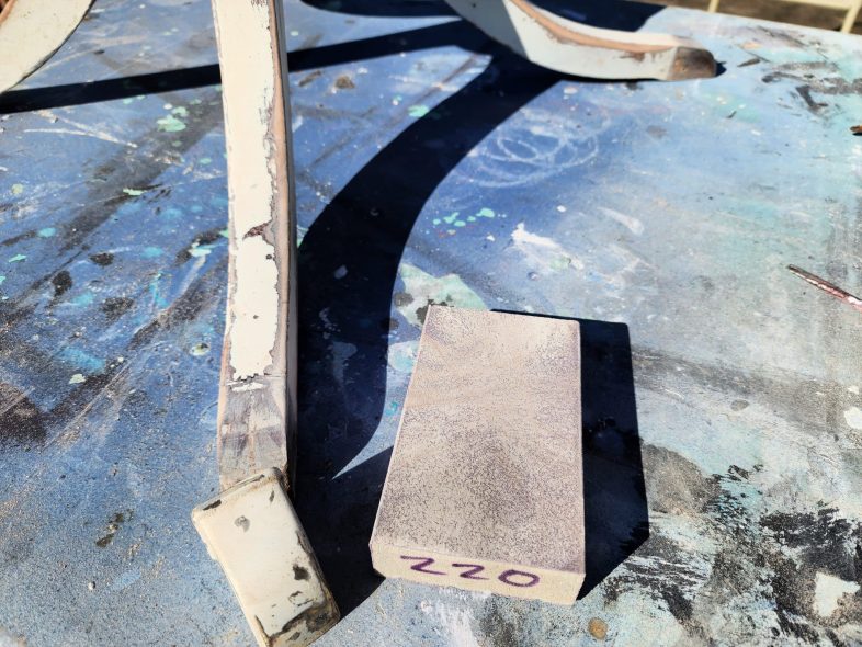 drum table legs with 220 grit sandpaper