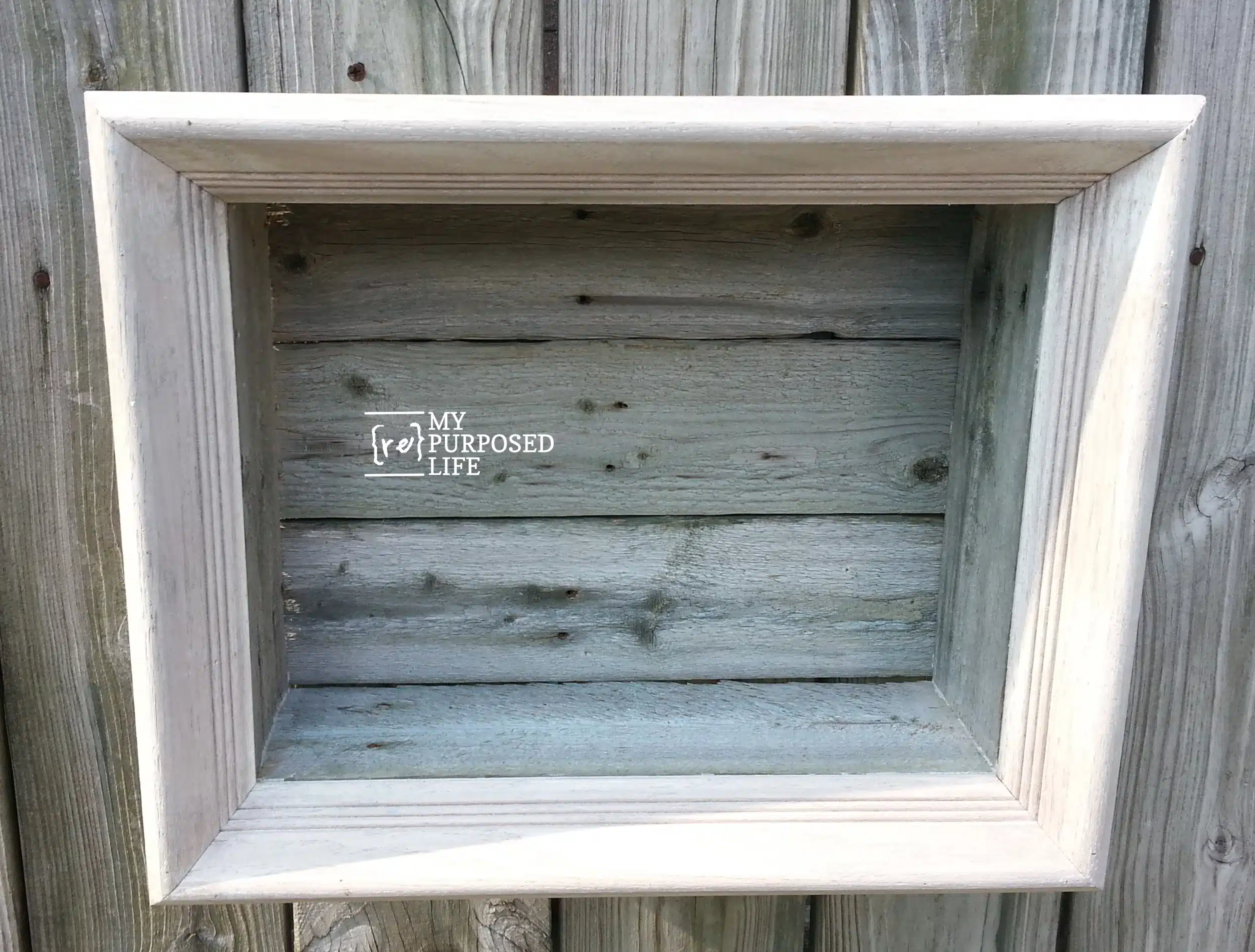 rustic shadow box made from a picture frame