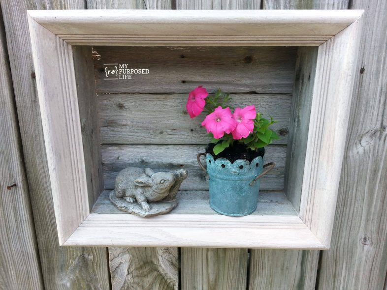 pretty rustic shadow box with flowers