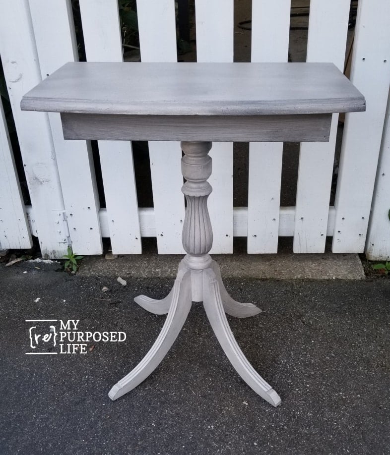 small gray claw table