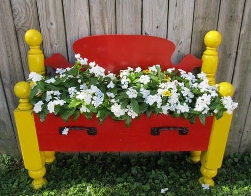 use an old bed for an outdoor planter
