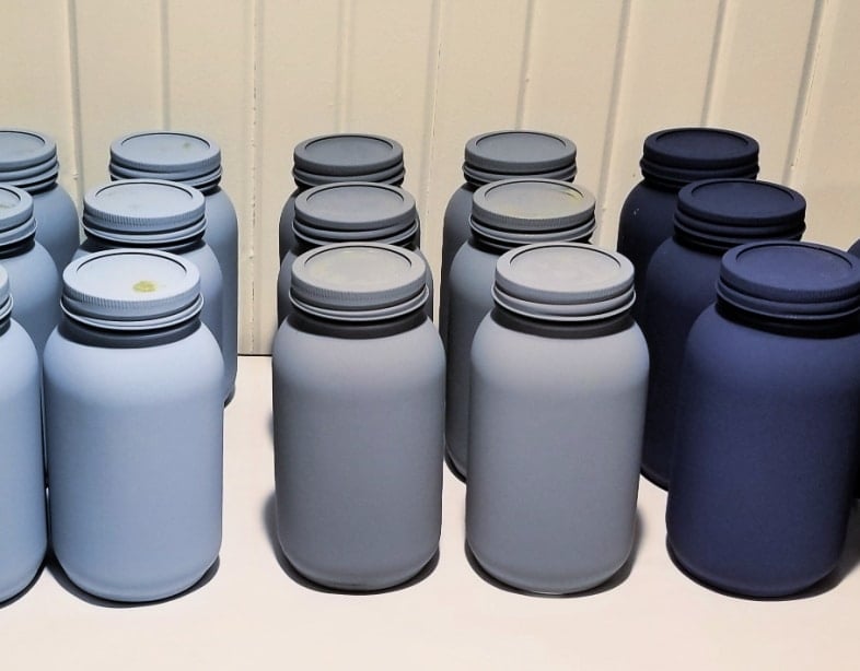 multi-color painted mason jars, light blue grays and dark blue