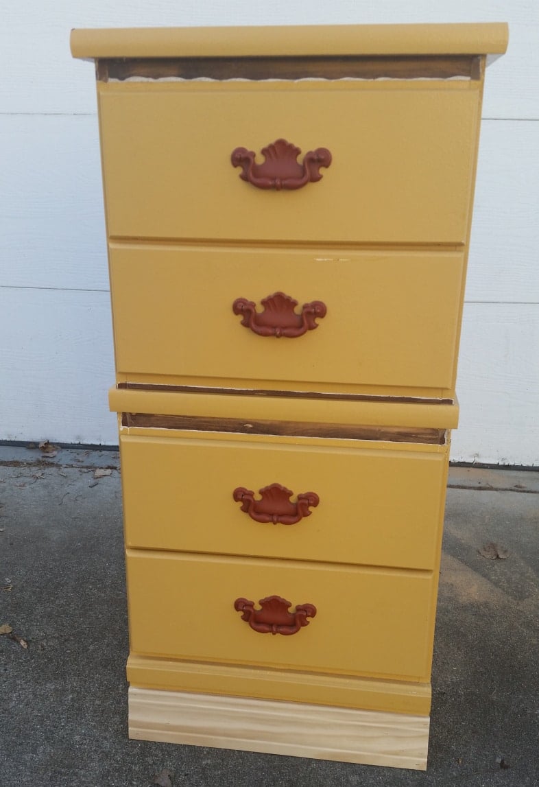 yellow nightstands stacked to make a chest