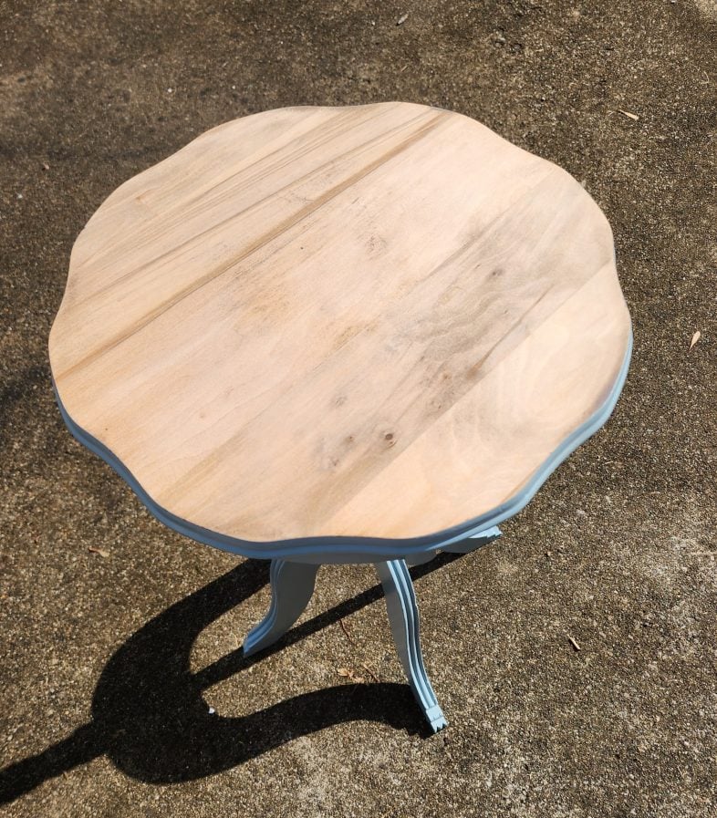 blue parlor table with the table top sanded smooth