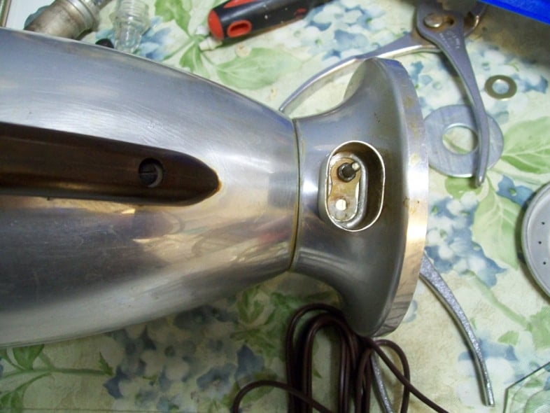 drill out original plug area to accept new wiring