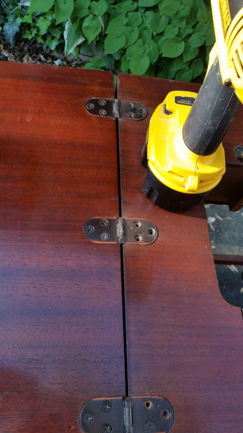 remove hinges from sewing cabinet