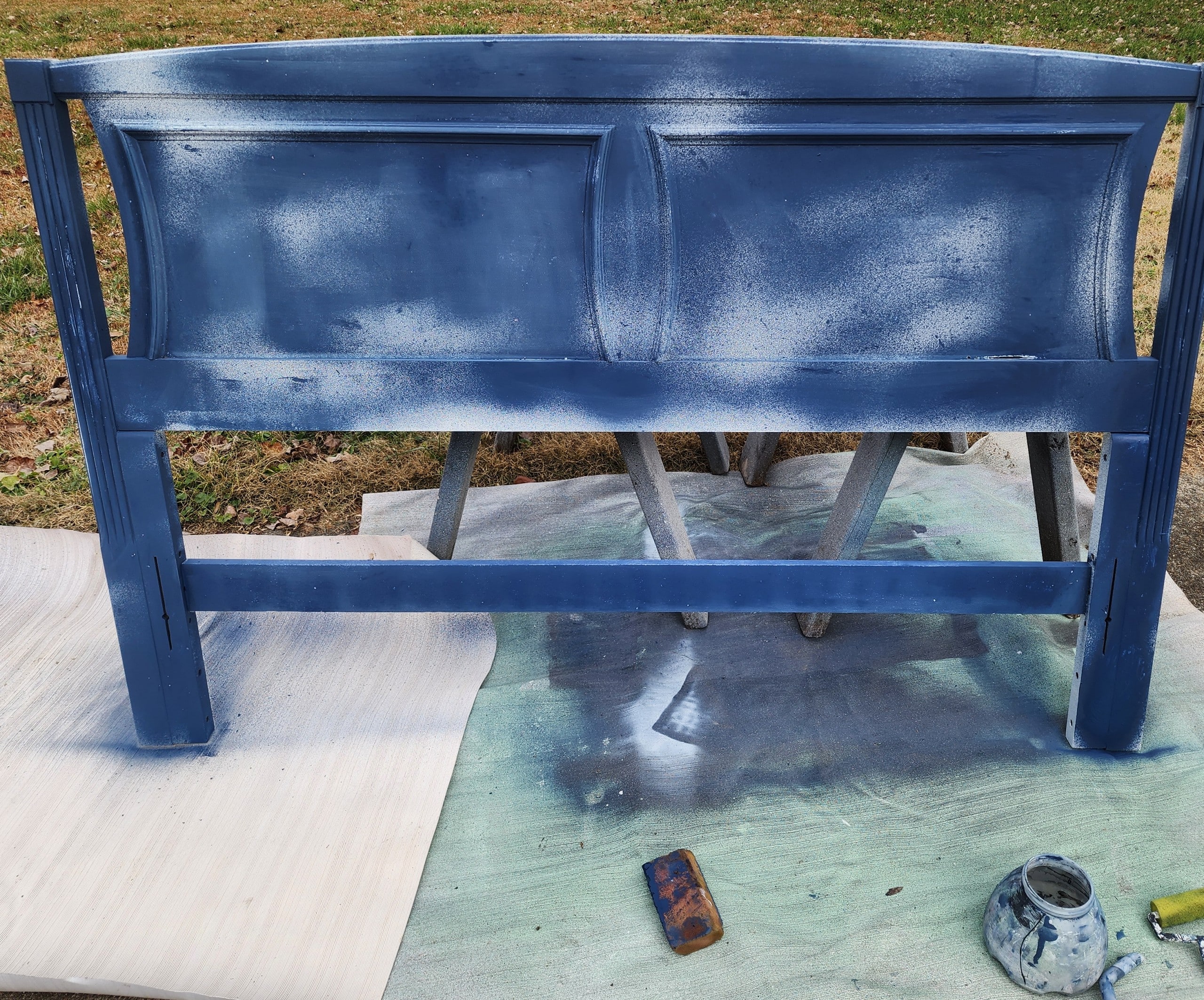 blotchy paint job on a vintage headboard