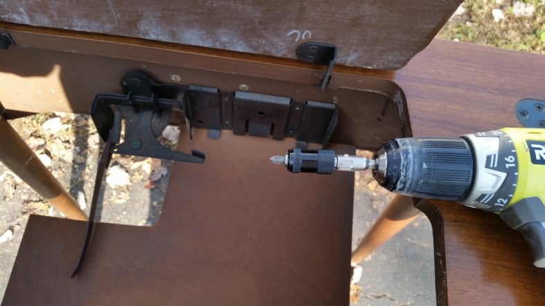 remove hardware from vintage sewing cabinet