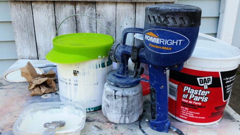 paint sprayer, paint and plaster of paris