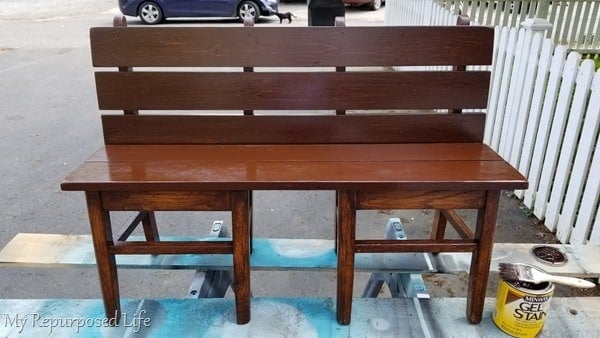 apply second coat of stain on chair bench