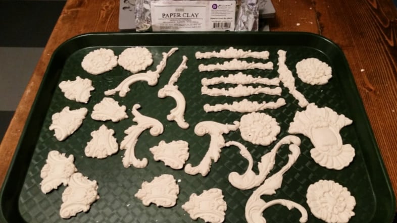appliques resting on a green tray