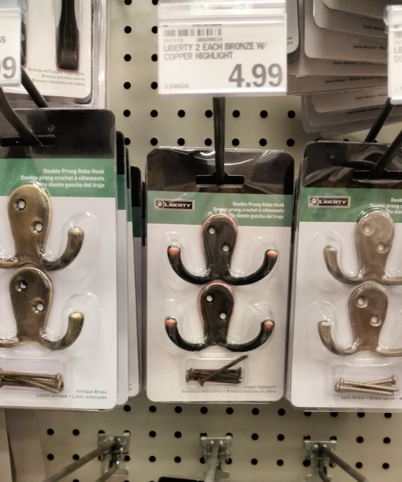 coat hooks hanging on a rack at the store