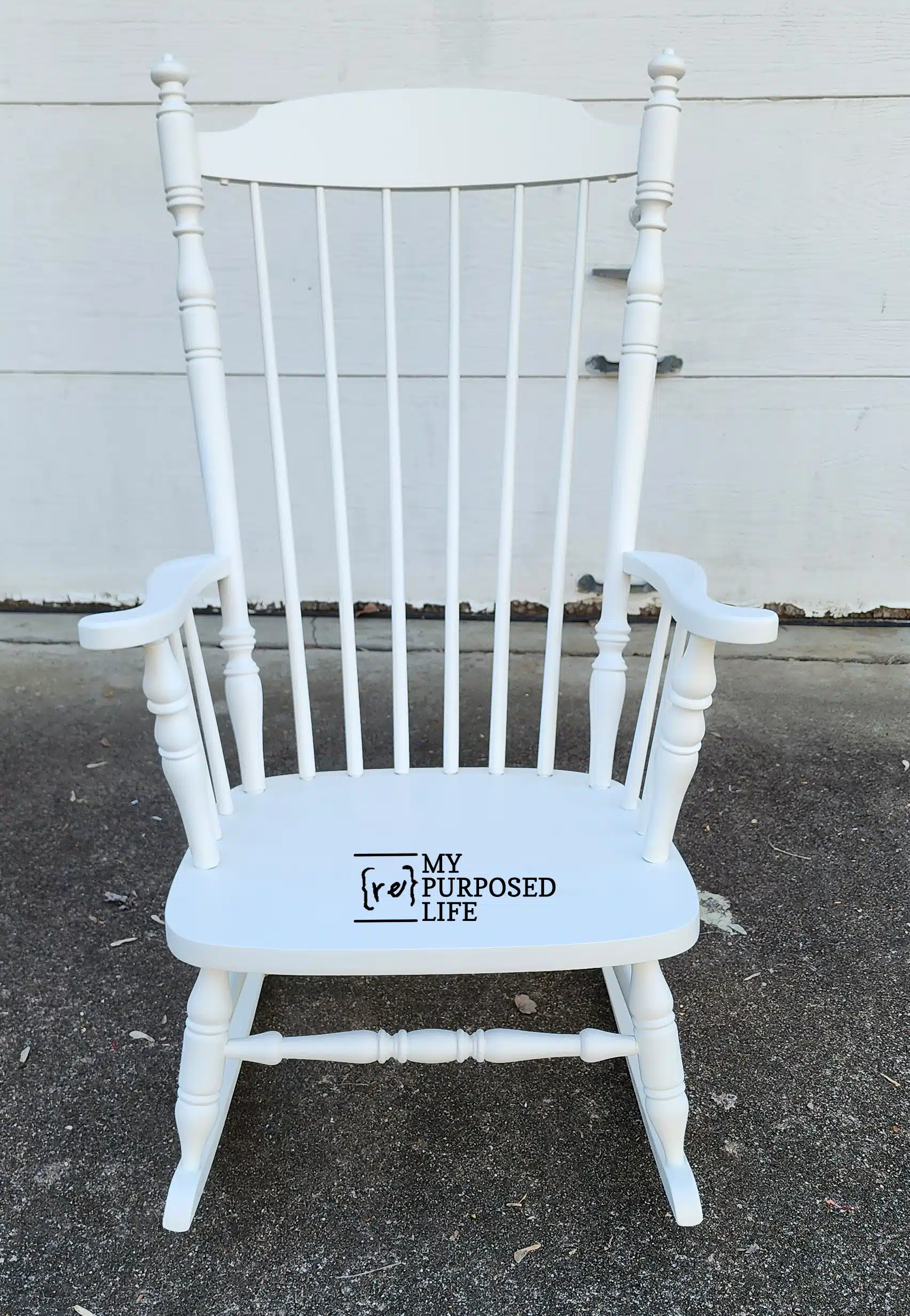 white wooden rocking chair