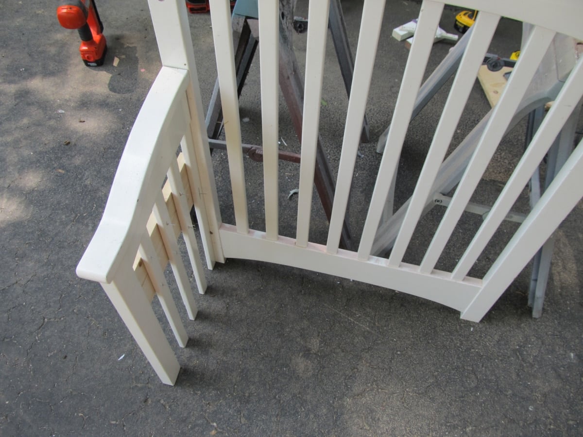 attach side rail to crib toy box