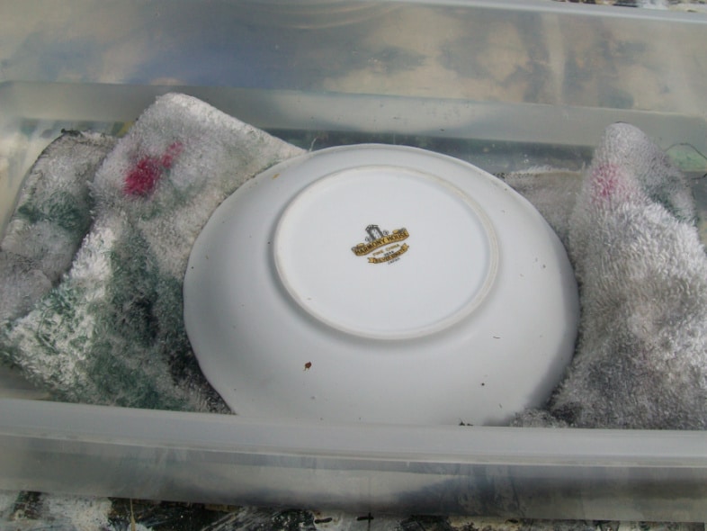 china in a tub of water