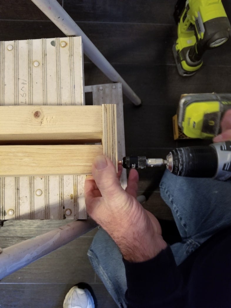 adding a block of wood to hold closet frame