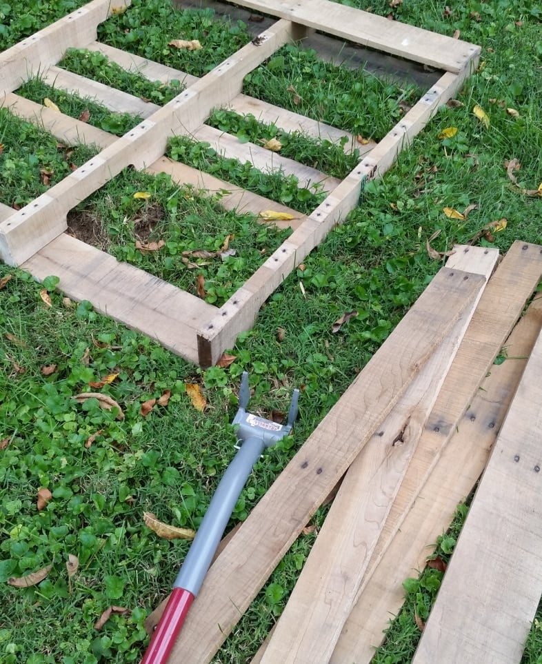 pallet boards removed from pallet - laying on the grass