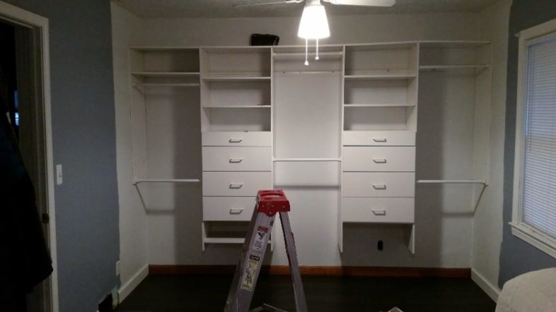 empty wall to wall closet before makeover