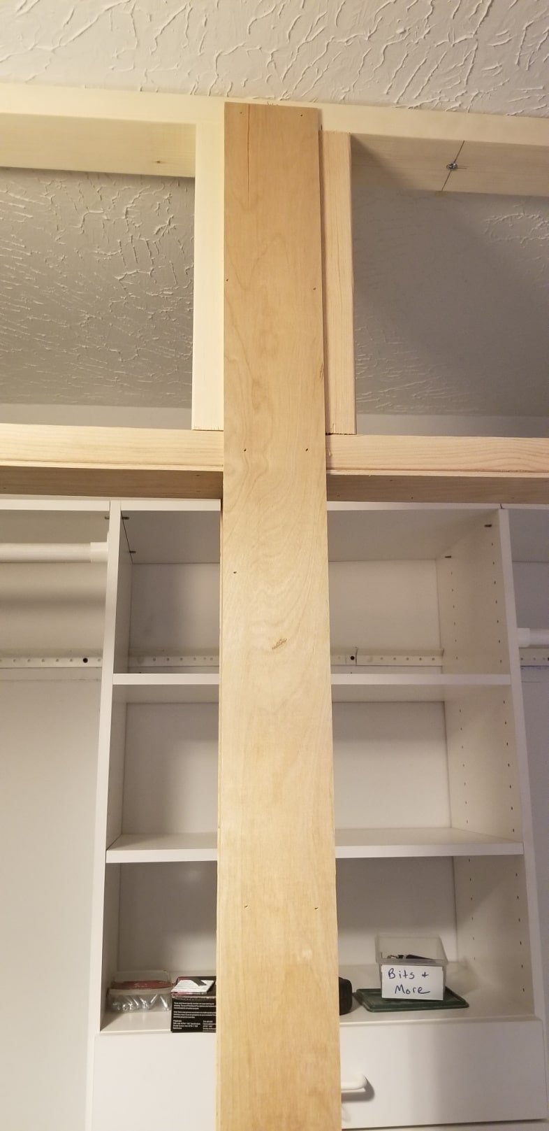 smooth thin plywood covering rough 2x4's as a facing