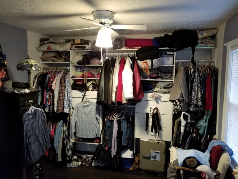 messy wall to wall closet
