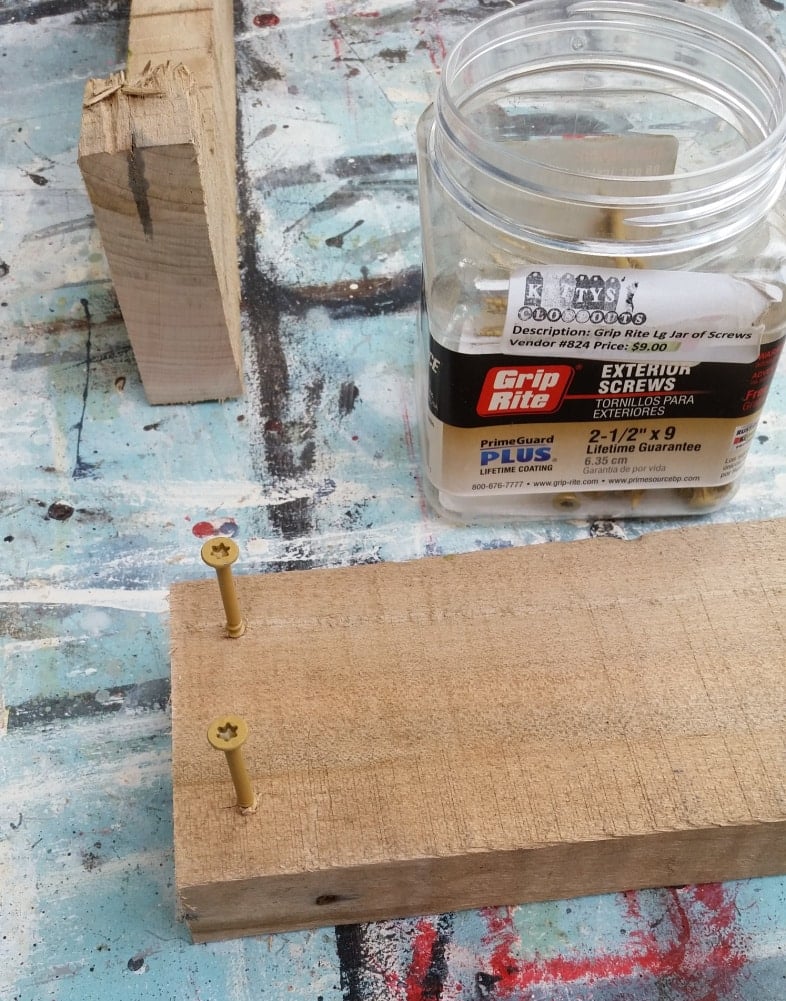 wood screws sticking out of a pallet board