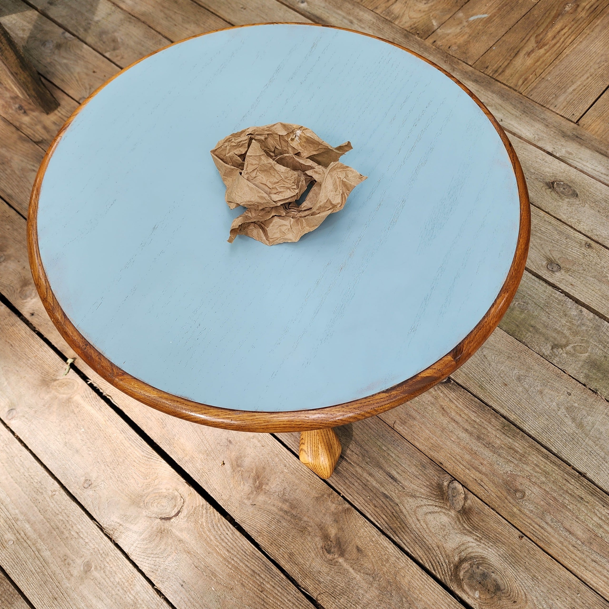 sanding paint with brown craft paper