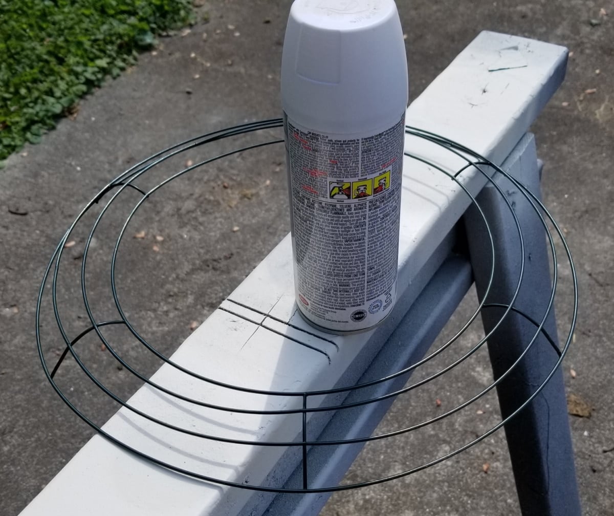 spray paint dollar store wire wreath form white