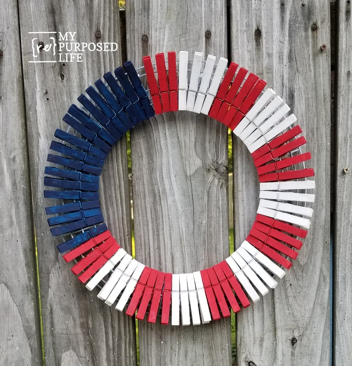 wire wreath form with red white and blue clothespins