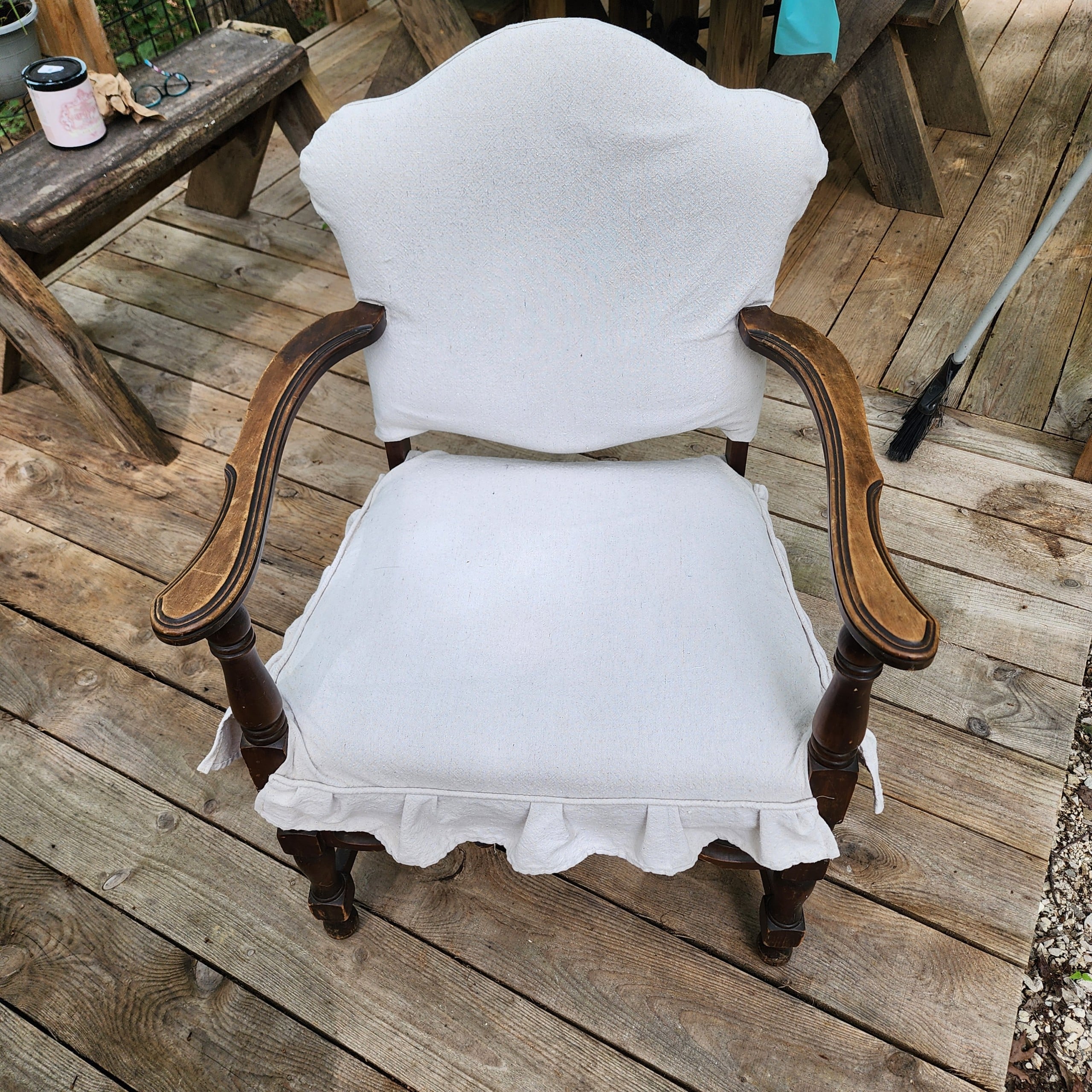 antique parlor chair with a drop cloth slipcover