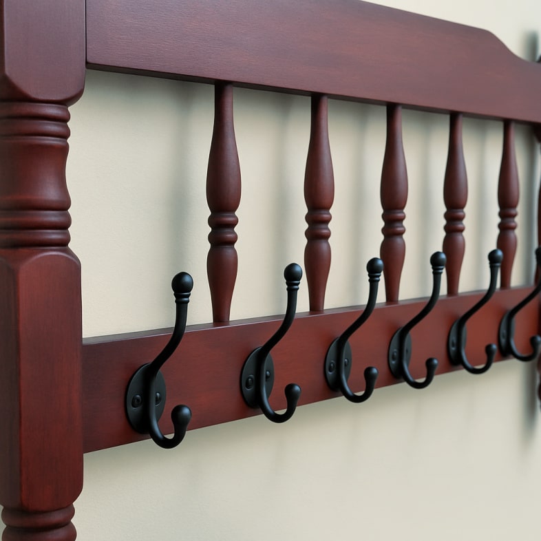 red coatrack made from a footboard