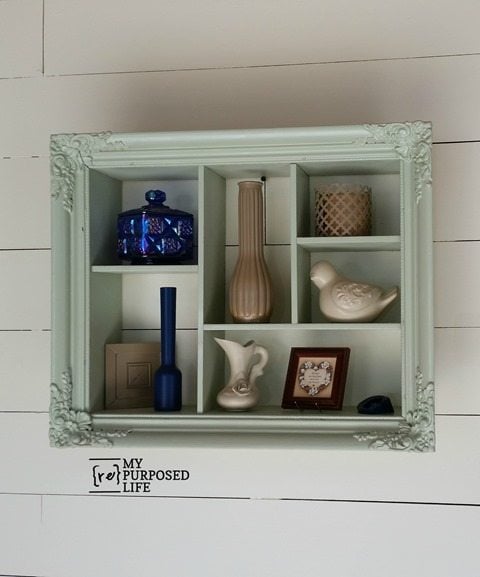 picture frame with collectables inside