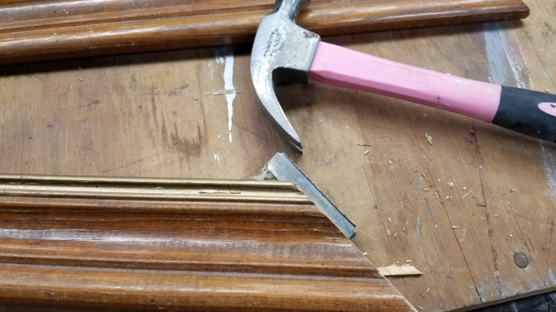 hammer removes picture frame support