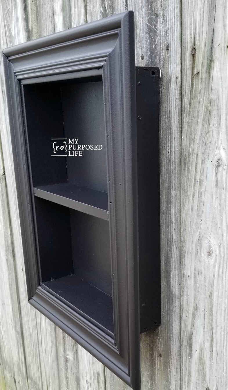 side view of black whadow box