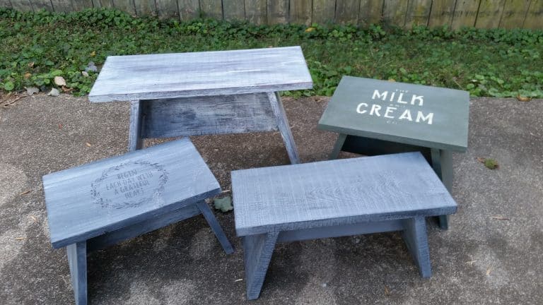 four small wooden stools