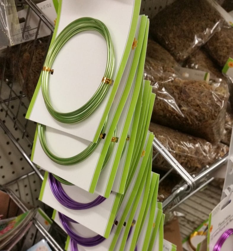 floral wire hanging on a shelf at dollar tree