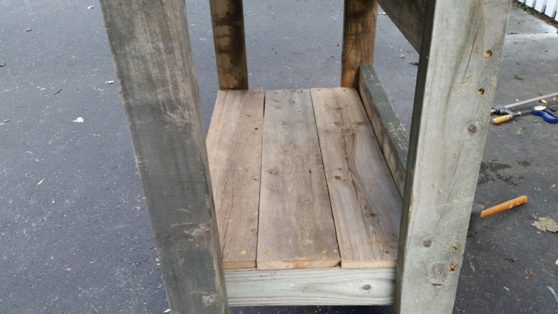 closeup of lower portion of outdoor bar construction