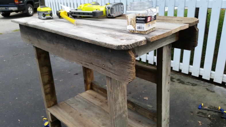 outdoor bar with tools layin on the top